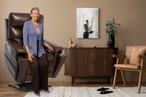 Senior woman relaxing in a Pride VivaLift Ultra lift chair with heat and massage - available at Vital Mobility Canada.